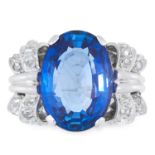 11.01 CARAT SAPPHIRE AND DIAMOND RING set with an oval cut sapphire of 11.01 carats between