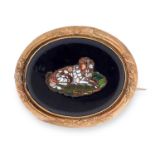 ANTIQUE MICROMOSAIC BROOCH designed as a large onyx oval set with various hardstones depicting a dog