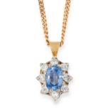 SAPPHIRE AND DIAMOND CLUSTER PENDANT set with an oval cut sapphire and round cut diamonds, 1cm, 4.