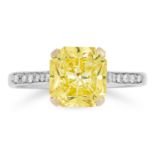 3.29 CARAT FANCY VIVID YELLOW DIAMOND RING set with a radiant cut fancy vivid yellow diamond of 3.29