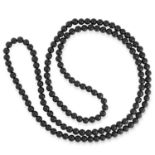 JET BEAD NECKLACE comprising of a single row of polished beads, 146cm, 115g.