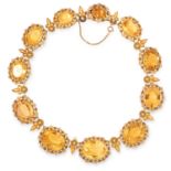 ANTIQUE CITRINE NECKLACE CIRCA 1860 comprising of eleven oval cut citrine in open backed setting,