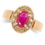 RUBY AND DIAMOND CLUSTER RING set with an oval cut ruby in a halo of rose cut diamonds, size M /