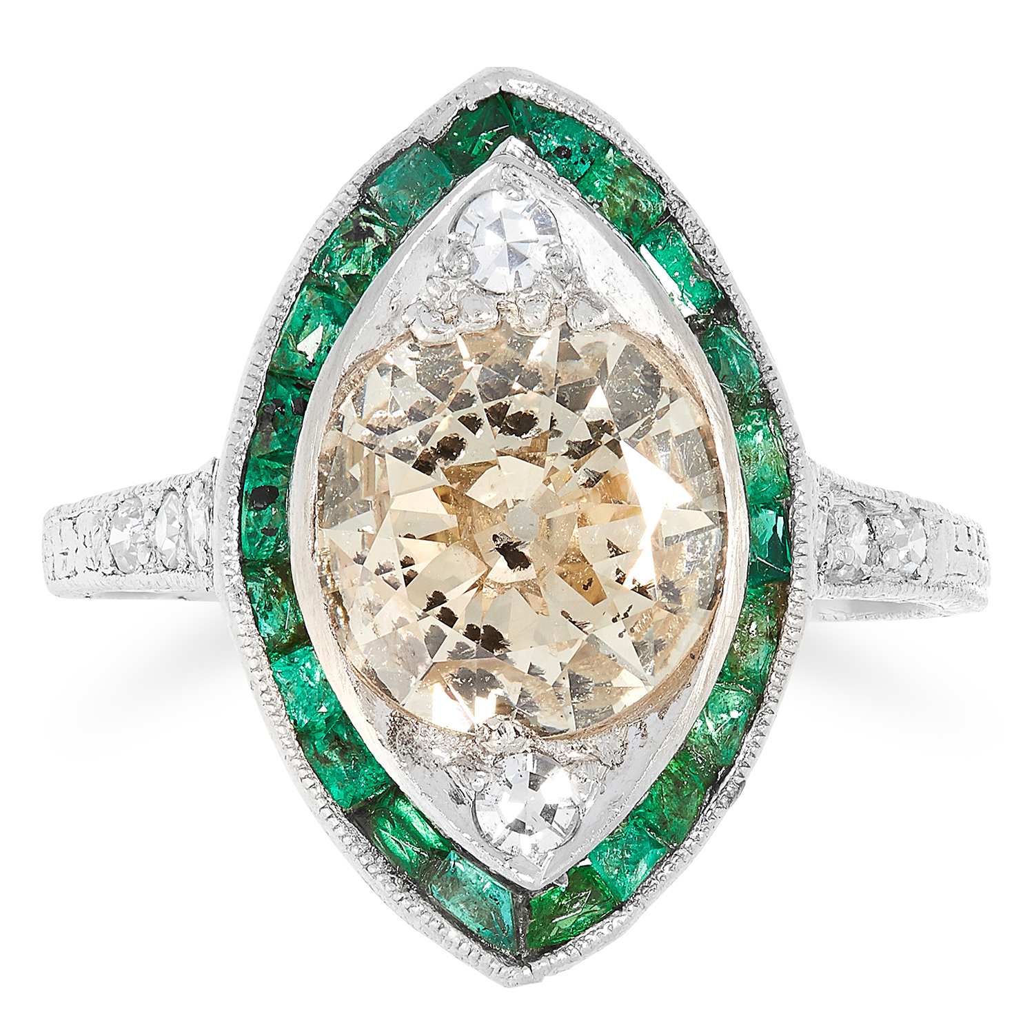 FANCY DIAMOND AND EMERALD RING in Art Deco design, set with an old cut fancy diamond of