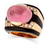 A RUBELLITE, ONYX AND DIAMOND RING in geometric design set with a cabochon rubellite, polished