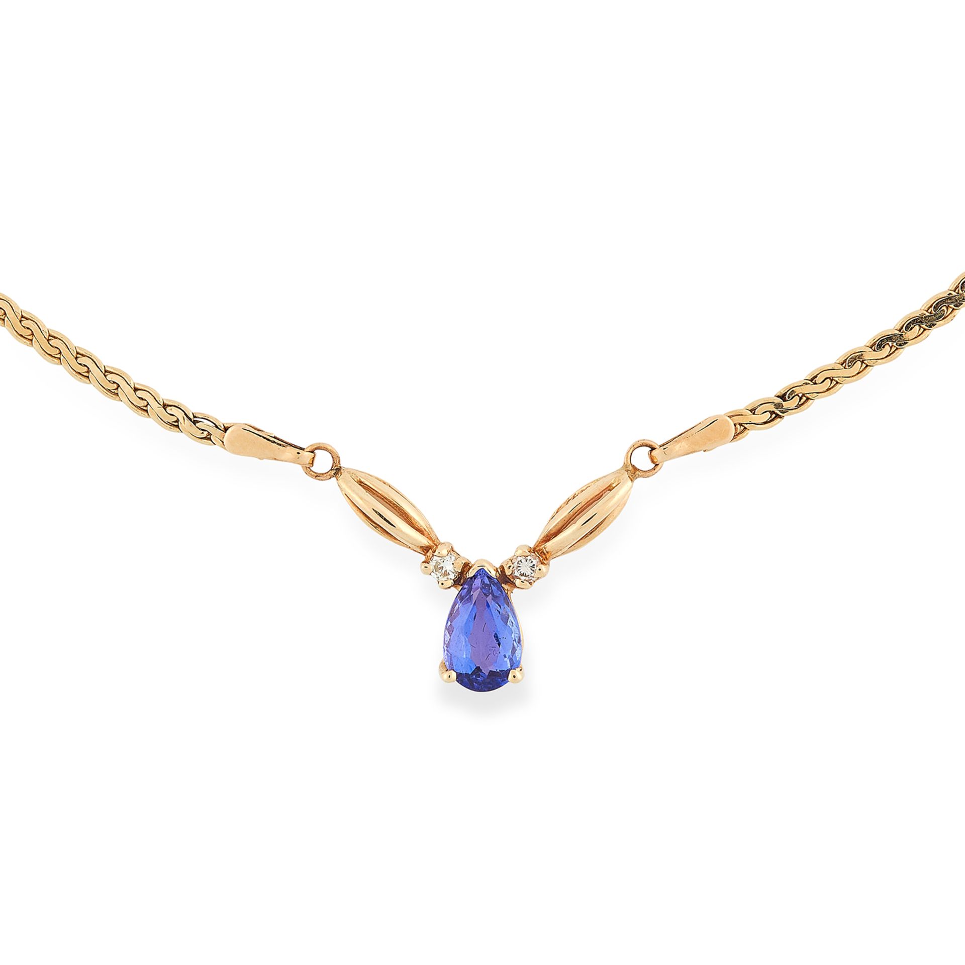 TANZANITE AND DIAMOND PENDANT NECKLACE set with a pear cut tanzanite between two round cut diamonds,