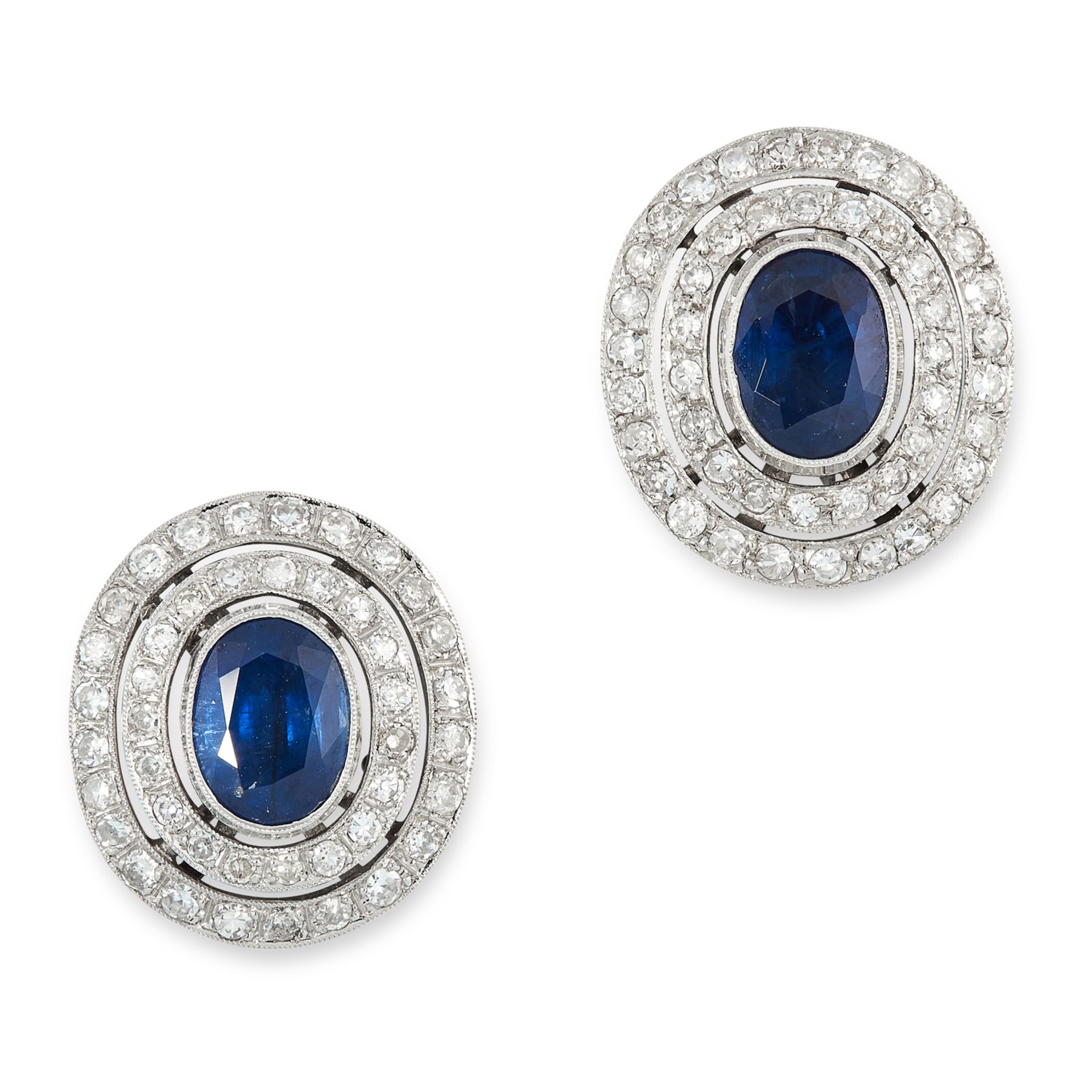 A PAIR OF SAPPHIRE AND DIAMOND CLUSTER EARRINGS in 18ct gold, comprising of an oval cut sapphire