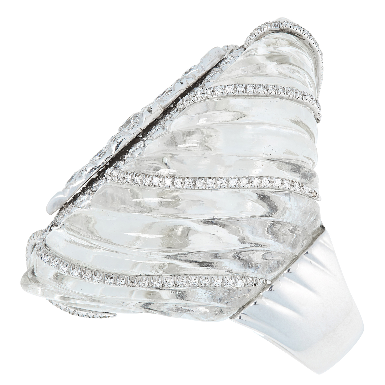 A CARVED ROCK CRYSTAL AND DIAMOND DRESS RING comprising of a carved rock crystal face set with round - Image 2 of 2