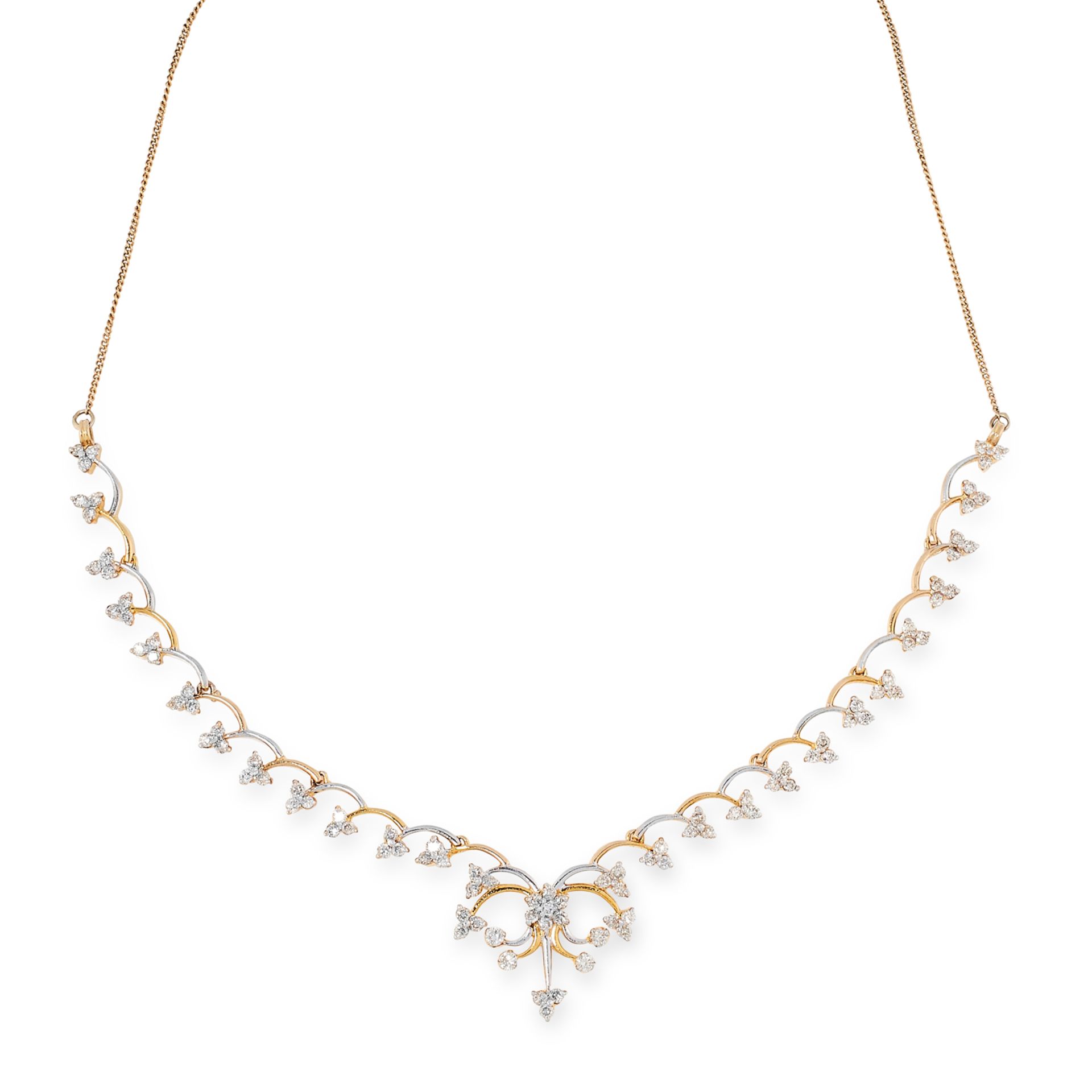 A DIAMOND NECKLACE in yellow and white gold, comprising of a half row of scroll links suspending