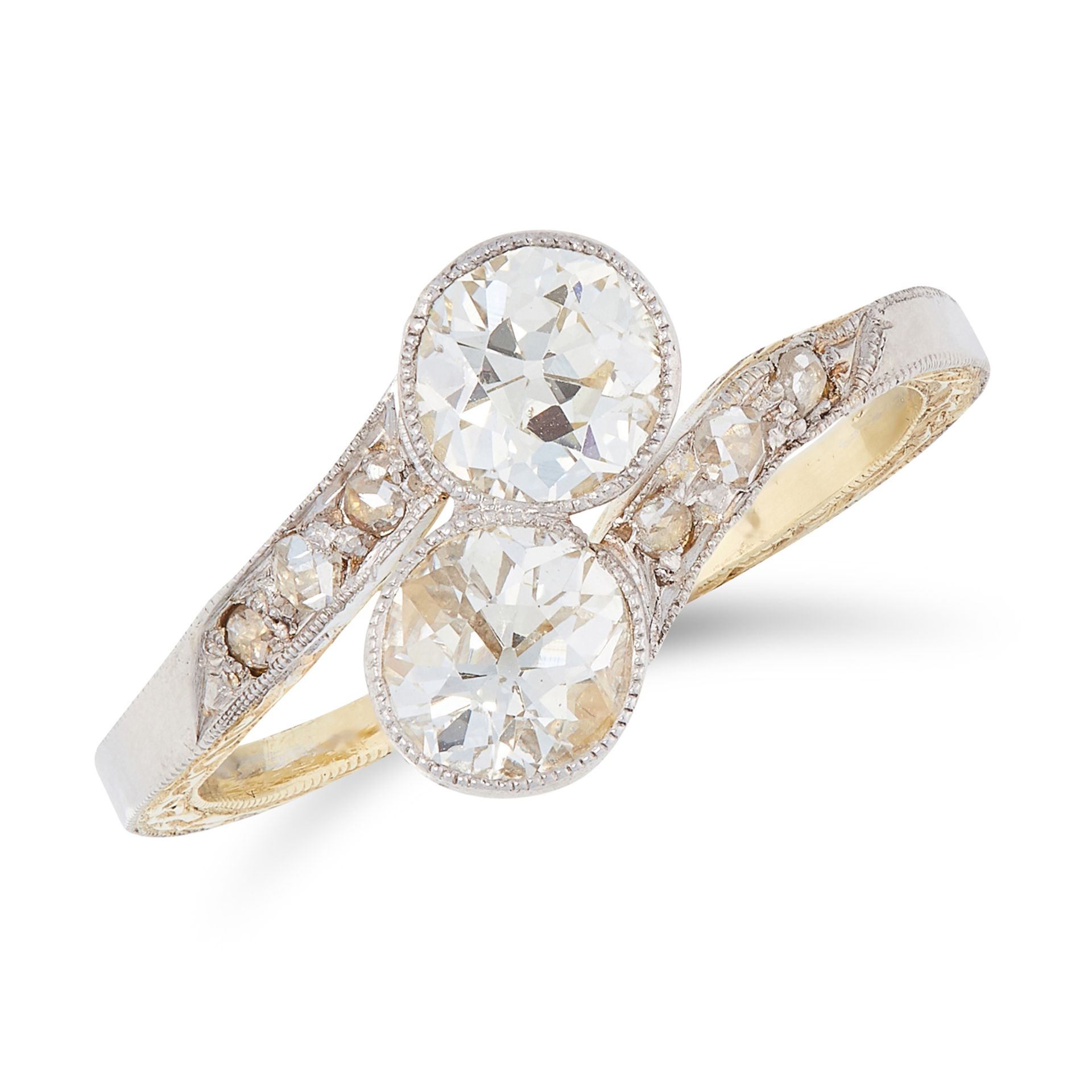 A DIAMOND CROSSOVER RING in yellow gold, set with two old round cut diamonds within a twisted