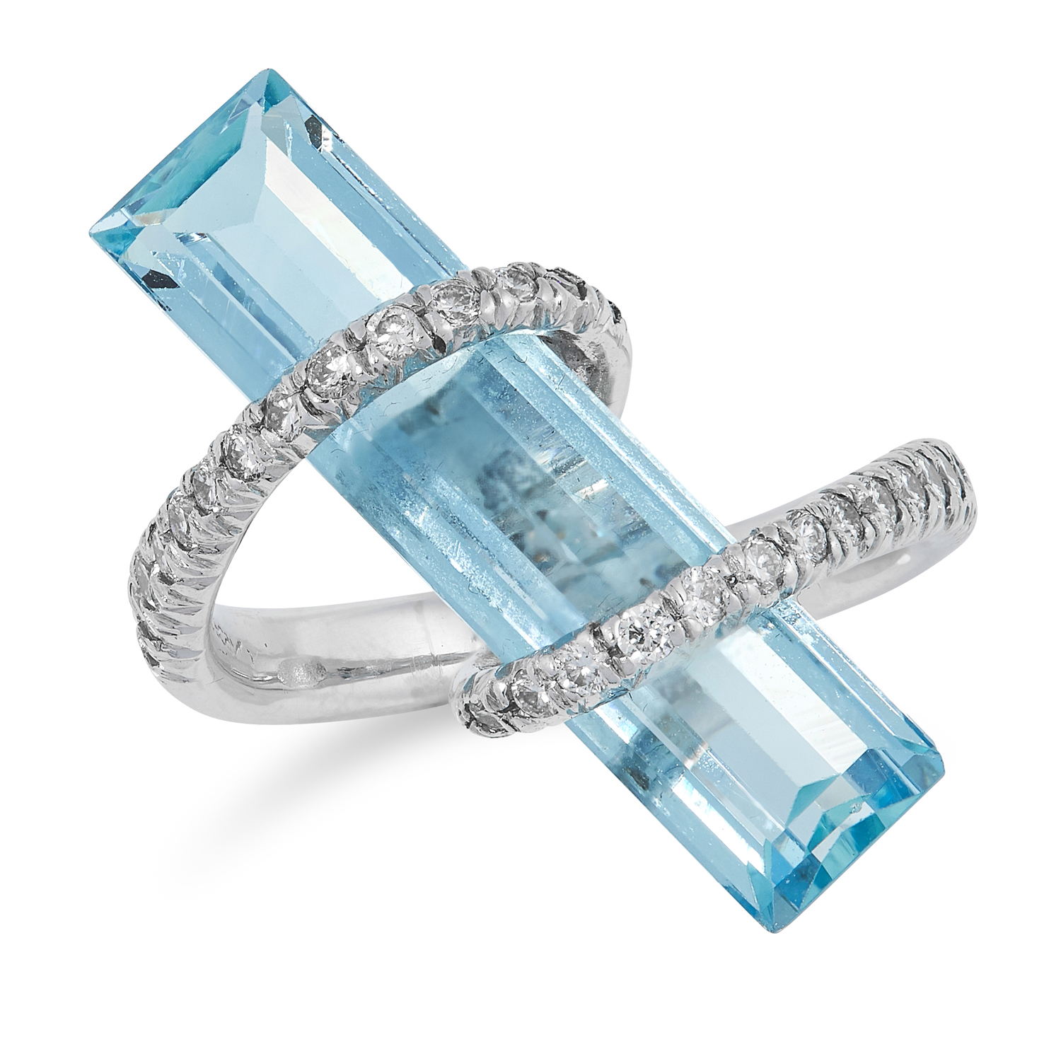 AN AQUAMARINE AND DIAMOND DRESS RING, SCAVIA comprising of an elongated baguette cut aquamarine in a