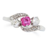 AN ANTIQUE RUBY AND DIAMOND RING, CIRCA 1900 in crossover design, set with a cushion cut ruby, round