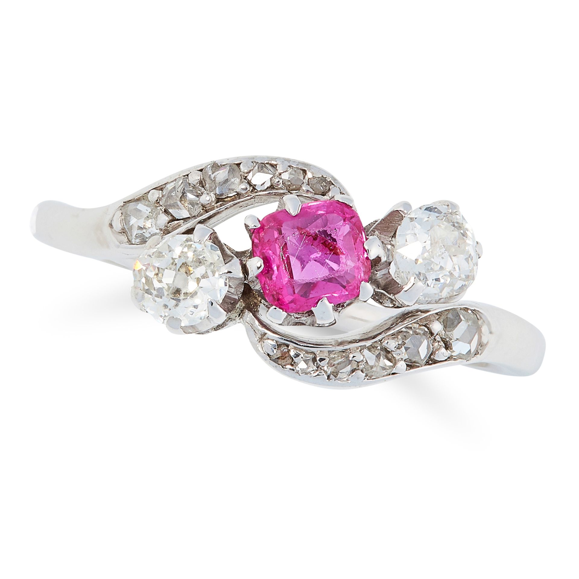 AN ANTIQUE RUBY AND DIAMOND RING, CIRCA 1900 in crossover design, set with a cushion cut ruby, round