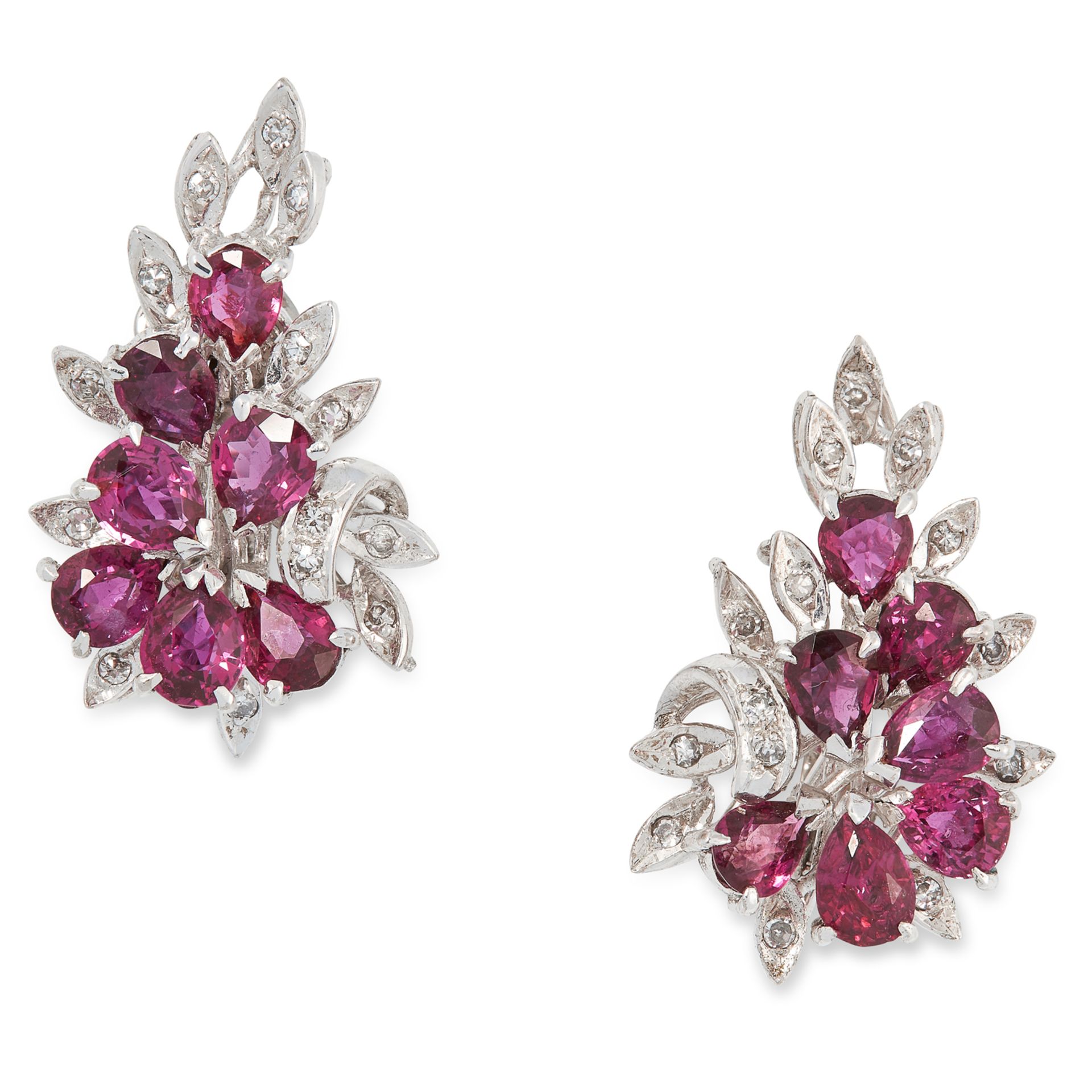 A PAIR OF RUBY AND DIAMOND CLUSTER EARRINGS, CIRCA 1950 in foliate design set with pear cut rubies