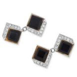 A PAIR OF POLISHED ONYX AND DIAMOND CUFFLINKS in Art Deco design set with polished onyx and round