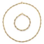 A DIAMOND FANCY LINK NECKLACE AND BRACELET SET in yellow gold, comprising of fancy links, set with