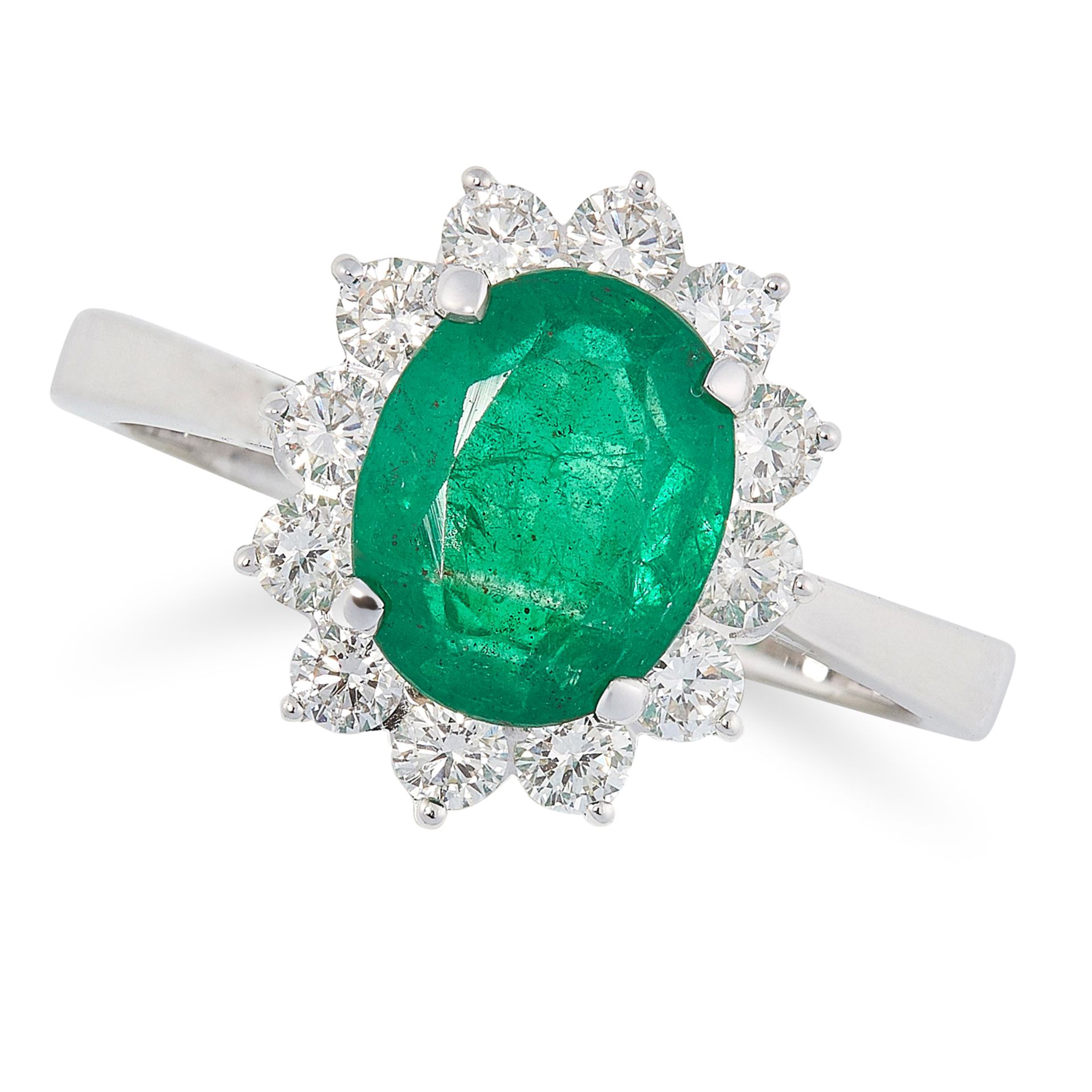 A 1.98 CARAT EMERALD AND DIAMOND CLUSTER RING in 18ct white gold, set with an oval cut emerald in