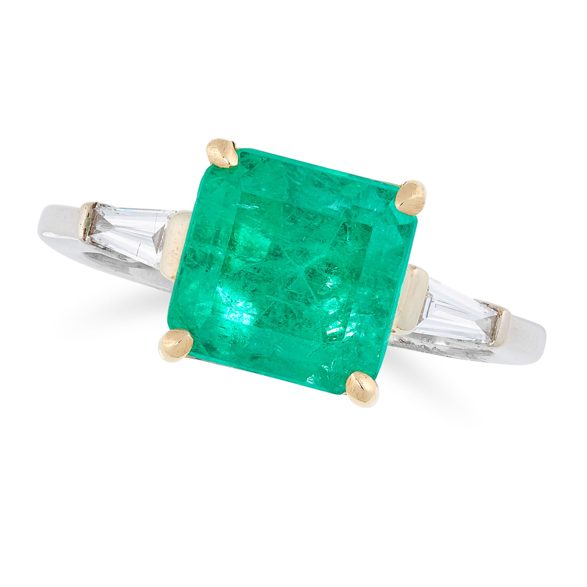 AN EMERALD AND DIAMOND RING in 18ct white gold, set with an emerald cut emerald of approximately