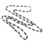 A BANDED AGATE BEAD NECKLACE comprising of a single row of polished agate beads on gold chain,