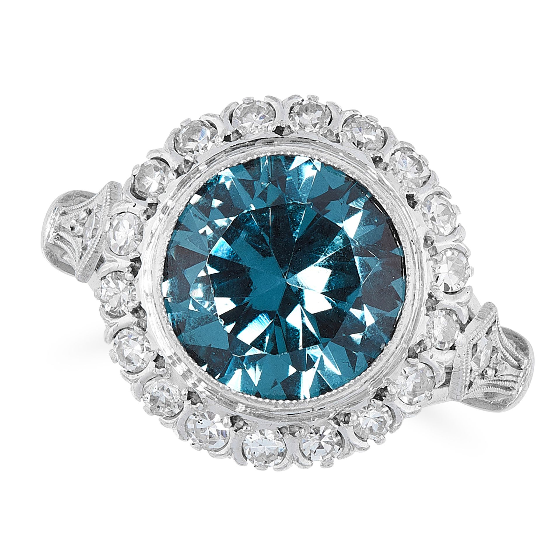 AN ANTIQUE ZIRCON AND DIAMOND RING, CIRCA 1930 in platinum, set with a central round cut blue zircon