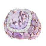AN AMETHYST, PINK SAPPHIRE AND DIAMOND DRESS RING set with a central fancy cut amethyst in a