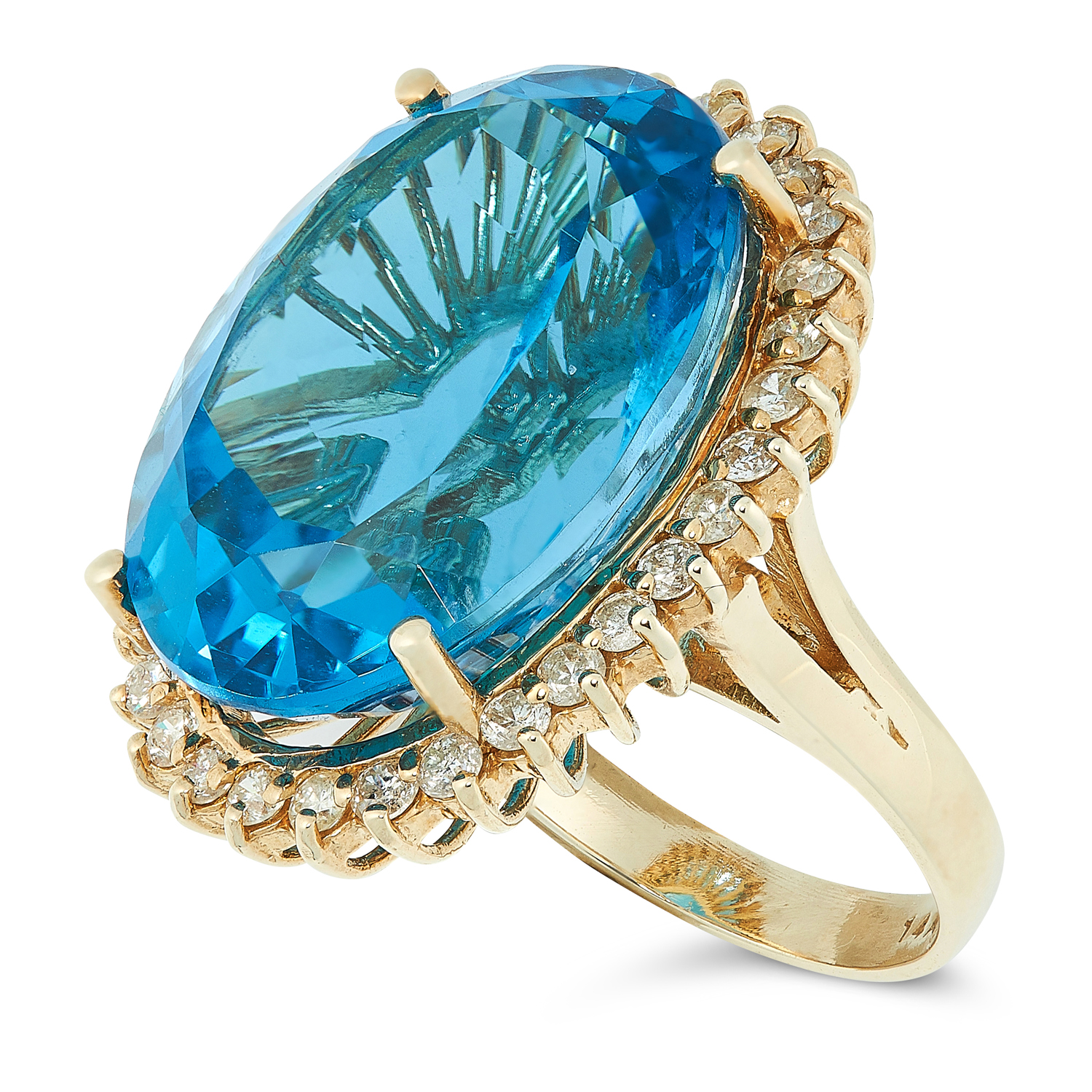 A TOPAZ AND DIAMOND CLUSTER RING set with an oval cut topaz of 27.8 carats, in a border of round cut - Image 2 of 2