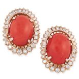 A PAIR OF CORAL AND DIAMOND CLUSTER EARRINGS each set with a cabochon coral in a cluster of baguette