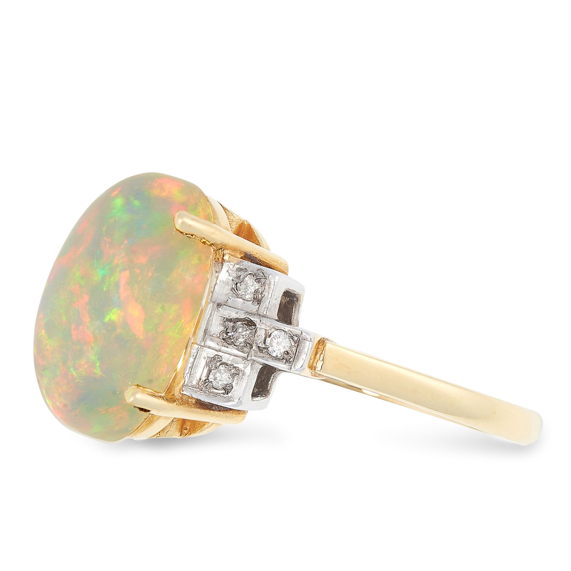 AN OPAL AND DIAMOND DRESS RING set with a cabochon opal between round cut diamonds, British - Bild 2 aus 2