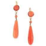 A PAIR OF CORAL DROP EARRINGS each formed of a cabochon coral suspending a polished coral drop,