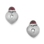 A PAIR OF GARNET AND DIAMOND STUD EARRINGS in white gold, designed as a heart set with a round