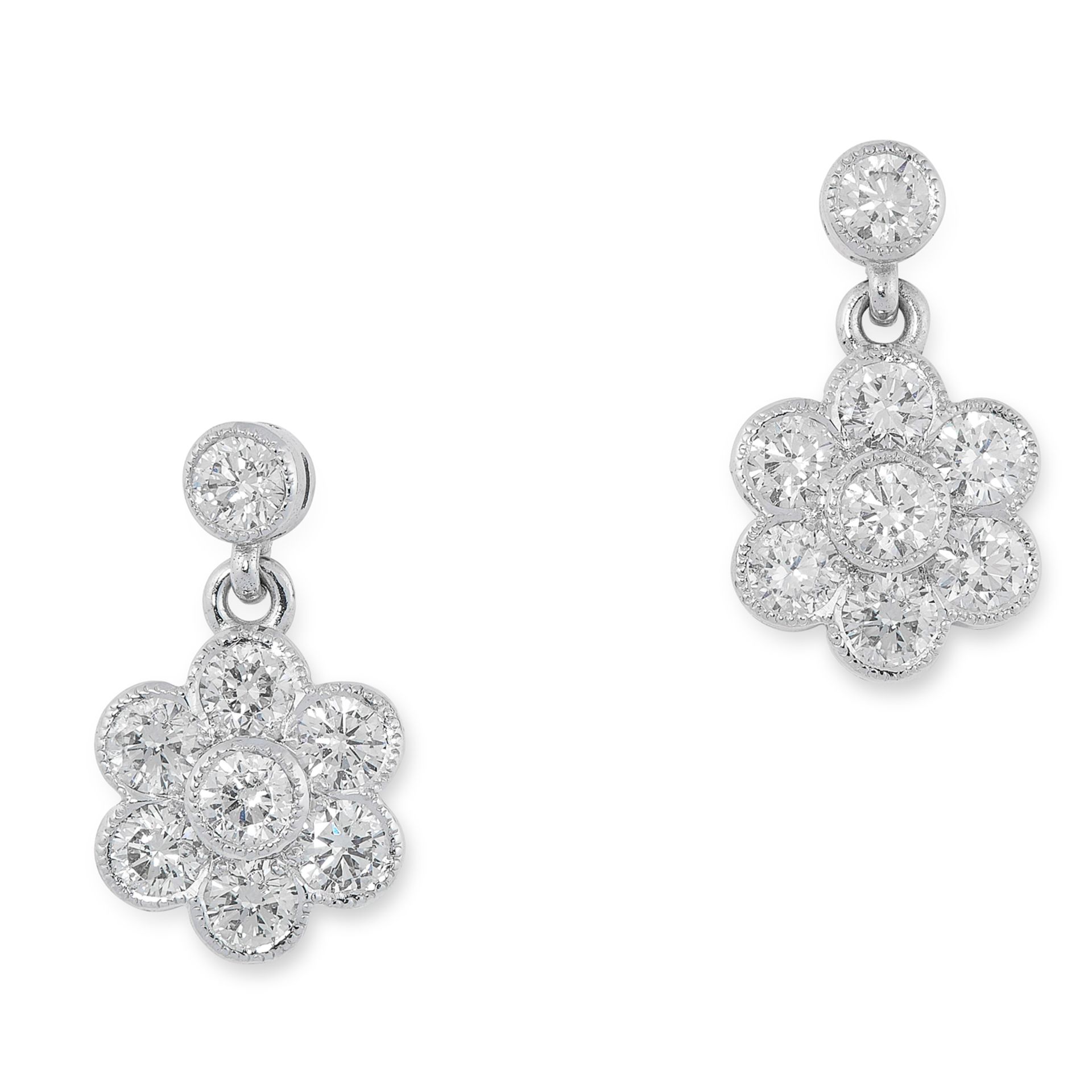 A PAIR OF DIAMOND CLUSTER EARRINGS in 18ct white gold, set with a round cut diamond, suspending a