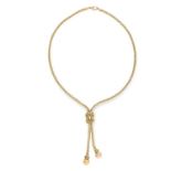 A KNOTTED FANCY LINK LAVALIER NECKLACE in 18ct yellow gold, the fancy link chain tied in a reef