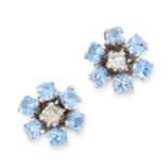 A PAIR OF BLUE TOPAZ AND DIAMOND CLUSTER STUD EARRINGS comprising of a round brilliant cut diamond