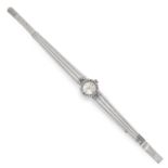 A VINTAGE DIAMOND LADIES WRIST WATCH, PREFIS 1968 in 18ct white gold, with a round cut diamond set