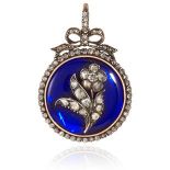 AN ANTIQUE GLASS AND DIAMOND 'FORGET ME NOT' PENDANT in yellow gold, in circular form, set with blue
