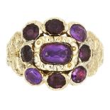 AN ANTIQUE AMETHYST MOURNING RING, CIRCA 1822 set with a cluster of oval cut amethyst, tests as 18ct