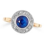 A SAPPHIRE AND DIAMOND CLUSTER RING set with a round cut sapphire in a border of rose cut