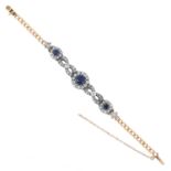 AN ANTIQUE SAPPHIRE AND DIAMOND BRACELET in yellow gold and silver, set with three clusters of round