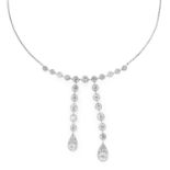 A DIAMOND LAVALIER NECKLACE, EARLY 20TH CENTURY in platinum, designed as a row of eleven old cut