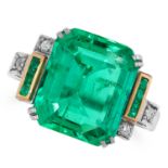 A COLOMBIAN EMERALD AND DIAMOND DRESS RING in 18ct white gold, set with a central emerald cut