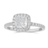 A 1.02 CARAT DIAMOND RING set with a cushion cut diamond of 1.02 carats in a halo of round cut