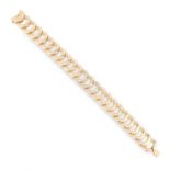 A C DE CARTIER DIAMOND BRACELET, CARTIER in 18ct yellow gold, comprising of C shaped links, three