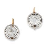 A PAIR OF ANTIQUE DIAMOND EARRINGS in yellow gold, each set with an old cut diamond totalling 1.8-