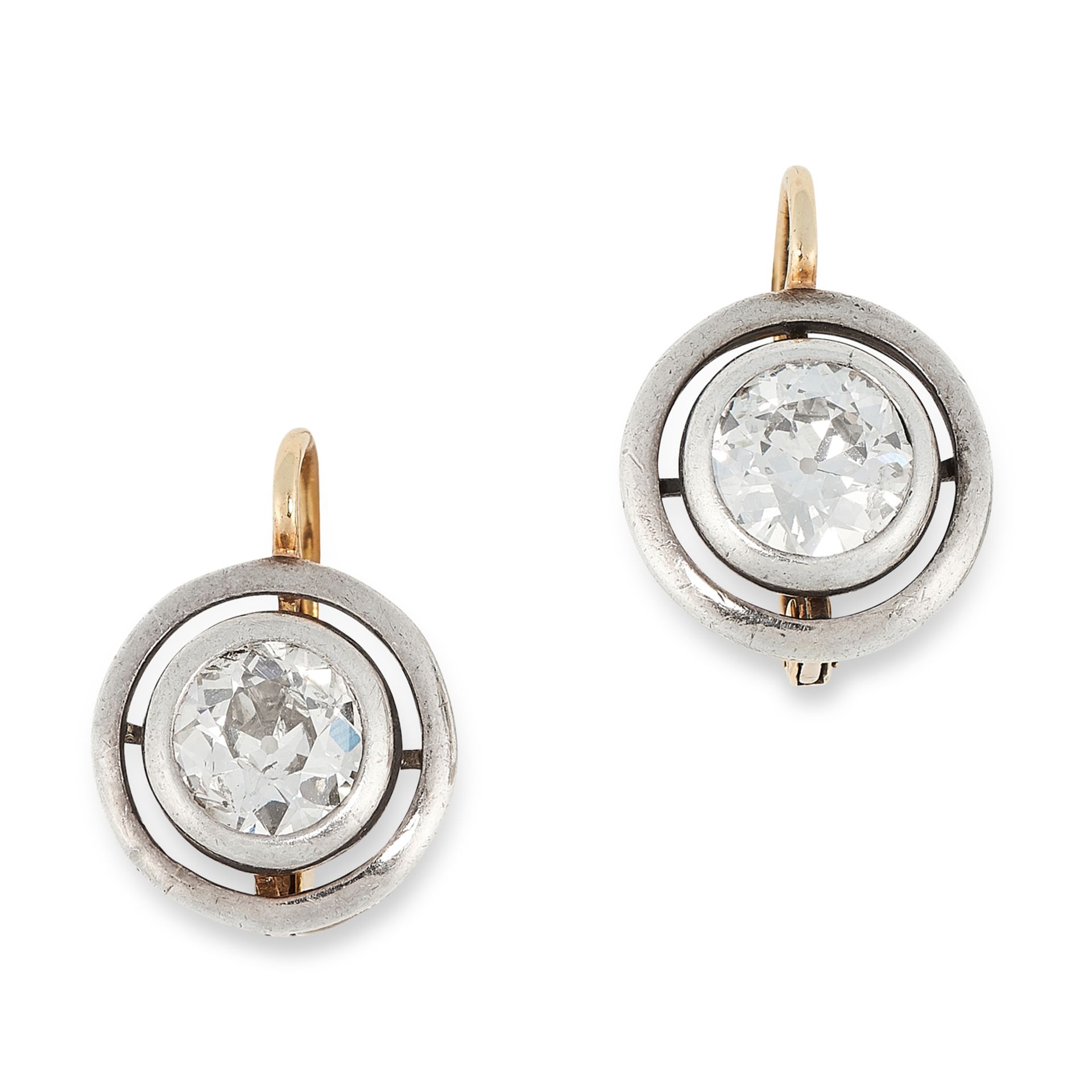 A PAIR OF ANTIQUE DIAMOND EARRINGS in yellow gold, each set with an old cut diamond totalling 1.8-
