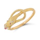 A RUBY AND DIAMOND SNAKE BANGLE in the form of a snake coiled around itself set with round cut