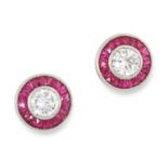 A PAIR OF DIAMOND AND RUBY TARGET EARRINGS each set with a round cut diamond within a border of