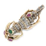 A RUBY, EMERALD AND DIAMOND SCORPION BROOCH in yellow gold and silver, designed as a scorpion, the