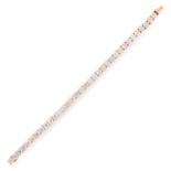 A DIAMOND LINE BRACELET comprising a single row of thirty four round cut diamonds