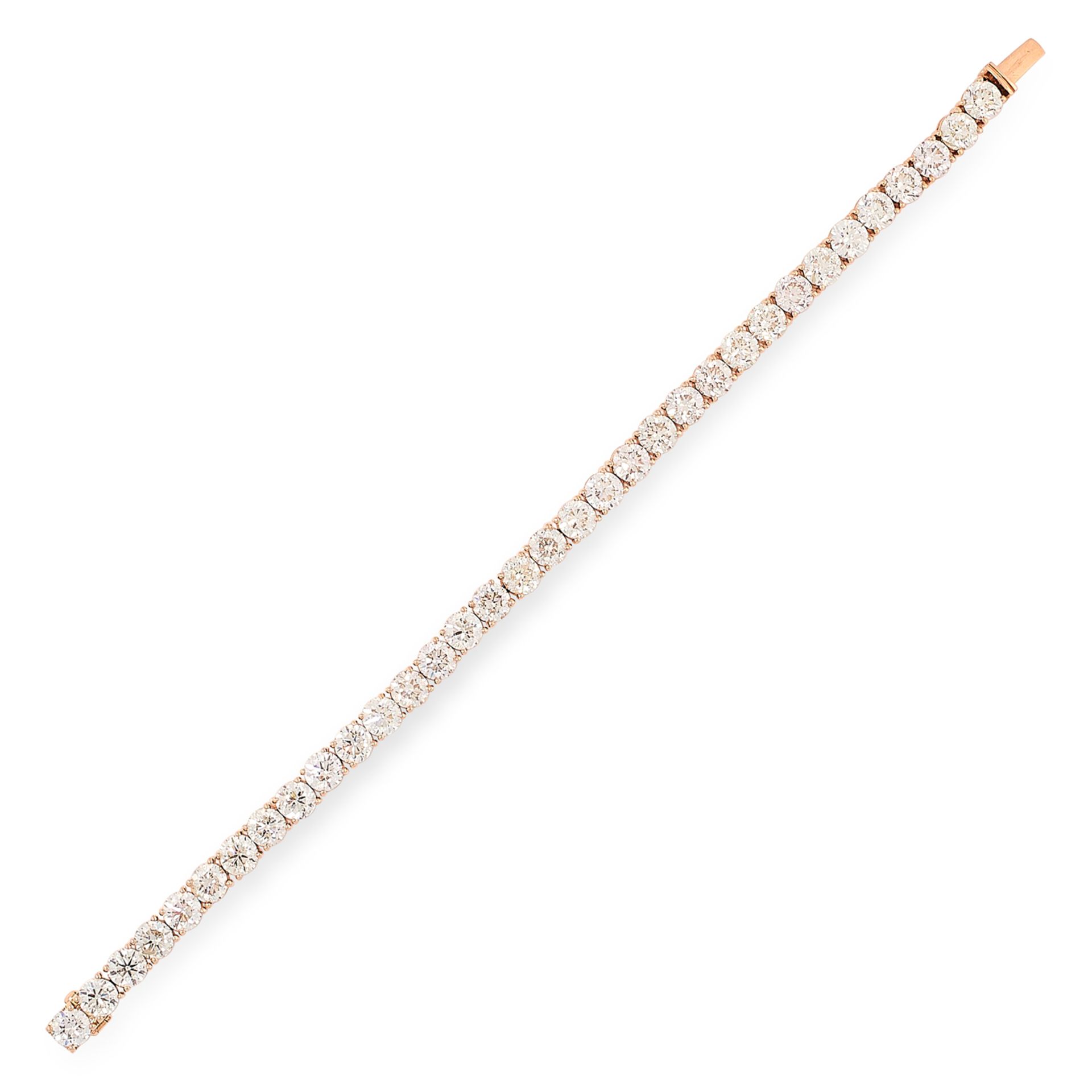 A DIAMOND LINE BRACELET comprising a single row of thirty four round cut diamonds