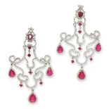 A PAIR OF RUBY AND DIAMOND CHANDELIER EARRINGS in 18ct white gold, the articulated bodies set with